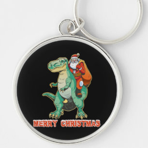 Santa reitet auf Dinosaurier Schlüsselanhänger