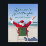 Santa relaxing on an Australian beach Feiertagspostkarte<br><div class="desc">Santa Claus at the Beach</div>