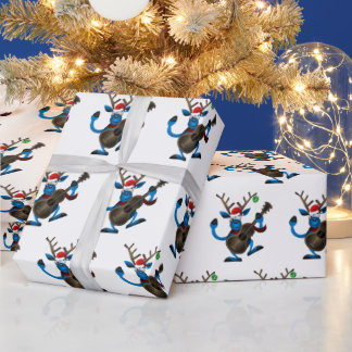 Santa Rentiere spielt Gitarre Geschenkpapier