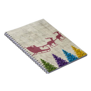 Santa’s Sleigh and Colorful Trees Notizblock