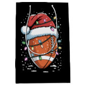 Santa trägt Weihnachts-American-Football-Spieler  Mittlere Geschenktüte (Vorderseite)