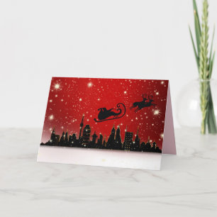 Santa über der Stadt Grußkarte Karte