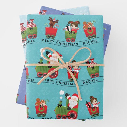 Santa und Brünettes Mädchen im Zug Geschenkpapier Set (Beispiel)