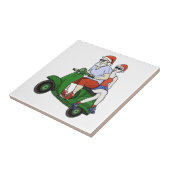 Santa und Frau Claus fahren mit einem Roller Fliese (Seite)