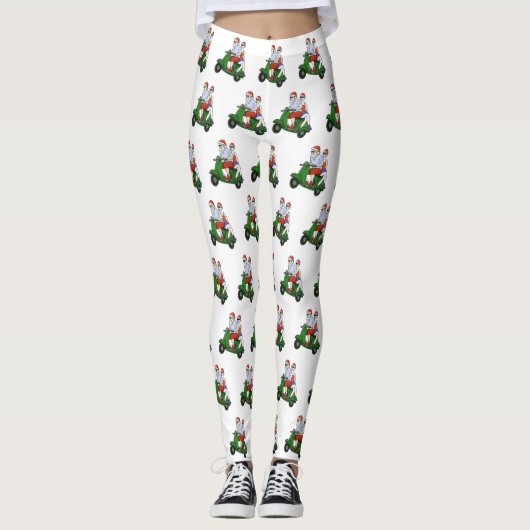 Santa und Frau Claus fahren mit einem Roller Leggings (Vorderseite)