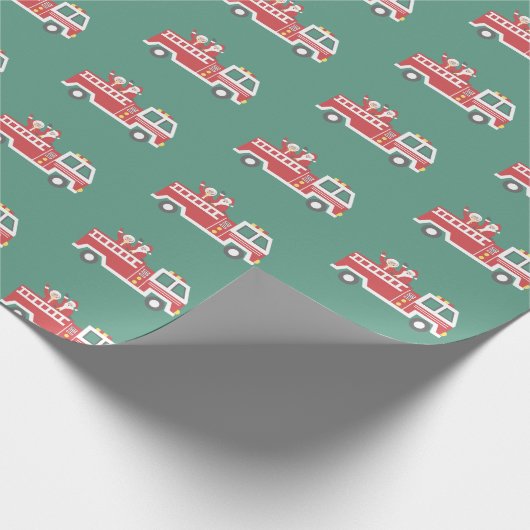 Santa und Mrs. Claus auf einem Weihnachts-Feuerwag Geschenkpapier (Ecke)