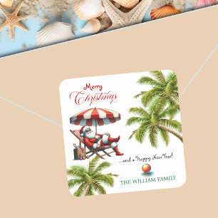 Santa unter einem Strandsonnenschirm Weihnachten Quadratischer Aufkleber