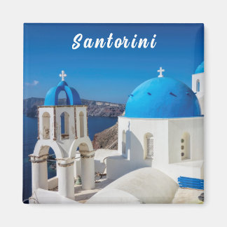 Santorin mit blauen und weißen Kirchen Magnet