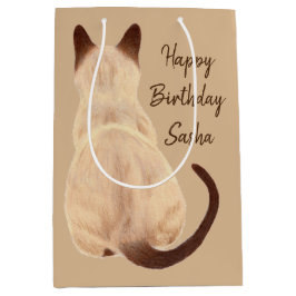 Sasha siamesische Katze, die hintere Mittlere Geschenktüte
