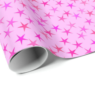 Satin-Sterne, orchiert auf blassrosa Geschenkpapier