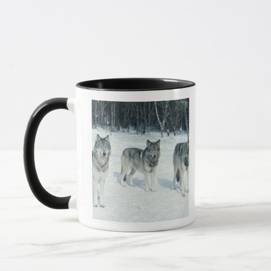 Satz Wölfe am Rand des schneebedeckten Waldes Tasse (Links)