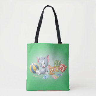 Säugling Tom und Jerry spielen mit Spielzeug Tasche
