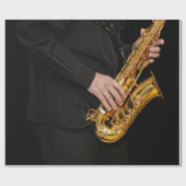 Saxophone Player gibt sächsischen Jazzspieler aus Geschenkpapier (Flach)