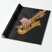 Saxophone Player gibt sächsischen Jazzspieler aus Geschenkpapier (Ungerollt)
