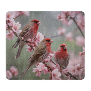 "Scarlet Trio: Rote Finken unter rosa Blüten" Schneidebrett