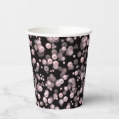 Scatterings von rosa und weißen Perlen auf schwarz Pappbecher (Links)