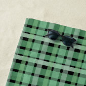 Schachte Karierte Karton-grüne Streifen auf schwar Strandtuch (Beispiel)