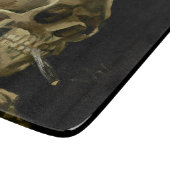 Schädel eines Skeletts mit brennender Zigarette Schneidebrett (Ecke)