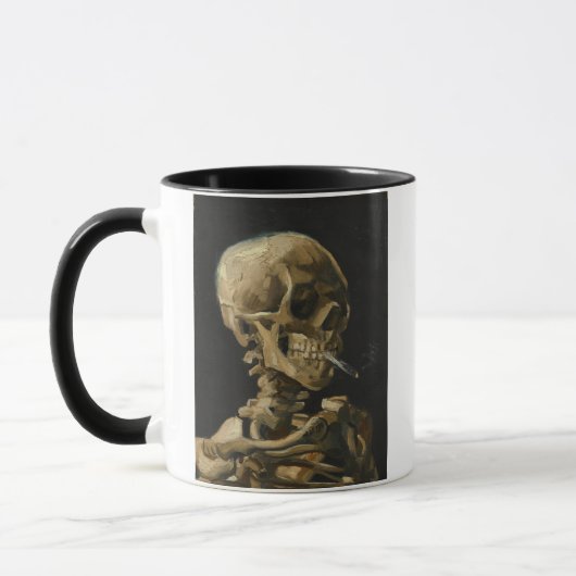 Schädel eines Skeletts mit brennender Zigarette vo Tasse (Links)