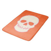 Schädel in Rosa, Orange und Creme Badematte (Schrägansicht)