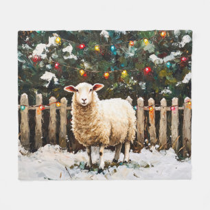 Schafe in einer weihnachtlichen Schneelandschaft Fleecedecke
