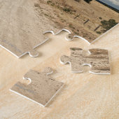 Schauen hinunter eine Schmutzlandstraße in Puzzle (Seite)