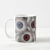 Schaut Tasse an (Links)