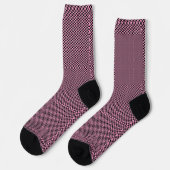 Scheckte schwarze und rosa Socken (Linkes Detail)