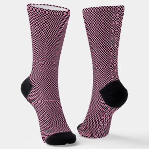 Scheckte schwarze und rosa Socken