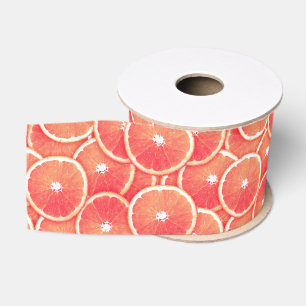 Scheiben der rosa Pampelmuse Ripsband