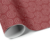 Scheintriskelion Dreifachspirale auf dunklem Rot Geschenkpapier (Rolleneckpunkt)