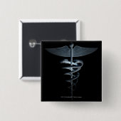 Scheinwerfer auf einem medizinischen Caduceus Button (Vorne & Hinten)
