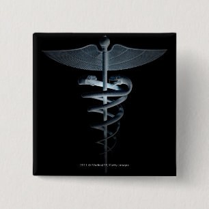 Scheinwerfer auf einem medizinischen Caduceus Button