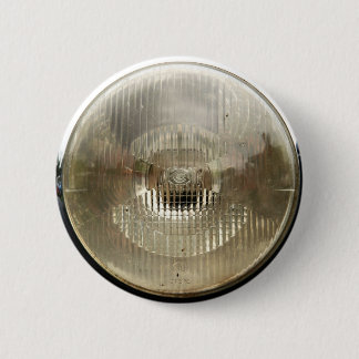 Scheinwerfer eines Oldtimers mit runder Klarglasli Button