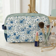 Schicke blaue und grüne florale Toilettentasche