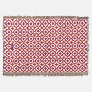 Schicke, farbenfrohe rote und violette Ikat-Stamme Decke