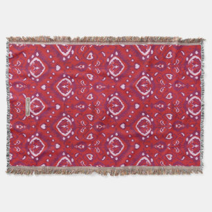 Schicke, farbenfrohe rote und violette Ikat-Stamme Decke