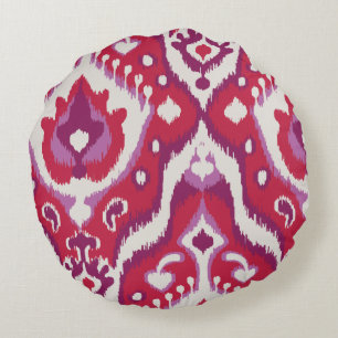 Schicke, farbenfrohe rote und violette Ikat-Stamme Rundes Kissen