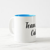 SCHICKER MUG_ TEAMCAT ZWEIFARBIGE TASSE (Vorderseite Links)