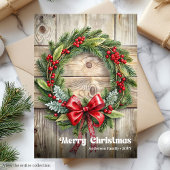Schicker Weihnachtskranz klassische Stechpalmenbee Feiertagskarte