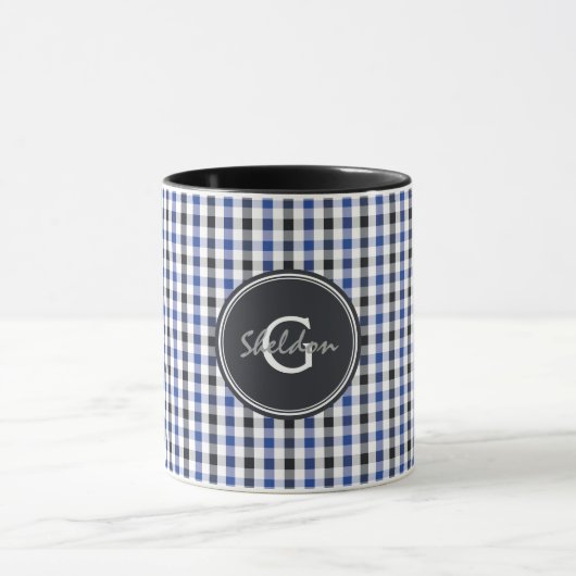 schickes adrettes Ginghammustermonogramm des Tasse (Zentrum)