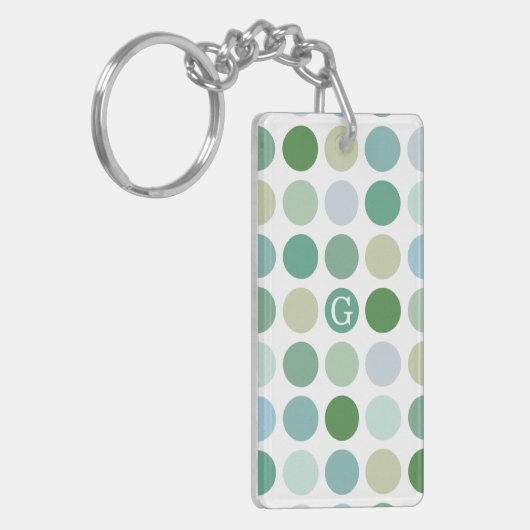Schickes buntes grünes Tupfenmustermonogramm Schlüsselanhänger (Vorderseite links)