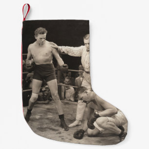 Schiedsrichter zählt über Boxer im Ringboxen, Vint Kleiner Weihnachtsstrumpf