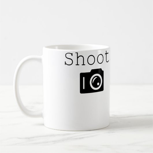 Schießen. Fotografie Fotograf mit Kamera Kaffeetasse (Links)