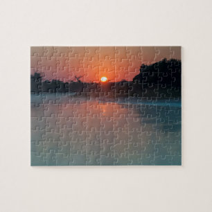 Schiff bei Sonnenaufgang am Fluss Puzzle