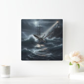Schiff in einem Sturm, geleitet von einem Leuchttu Quadratische Wanduhr (Zuhause)