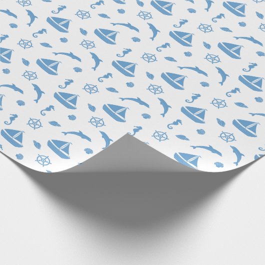 Schiffe und Delphine blaues Muster Geschenkpapier (Ecke)