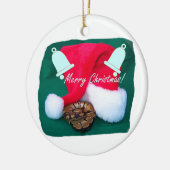 Schlange durch frohe Weihnachten und Glocken der Keramikornament (Links)