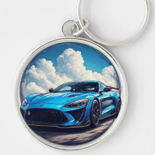 Schlankes blaues Sportauto unter einem lebendigen  Schlüsselanhänger