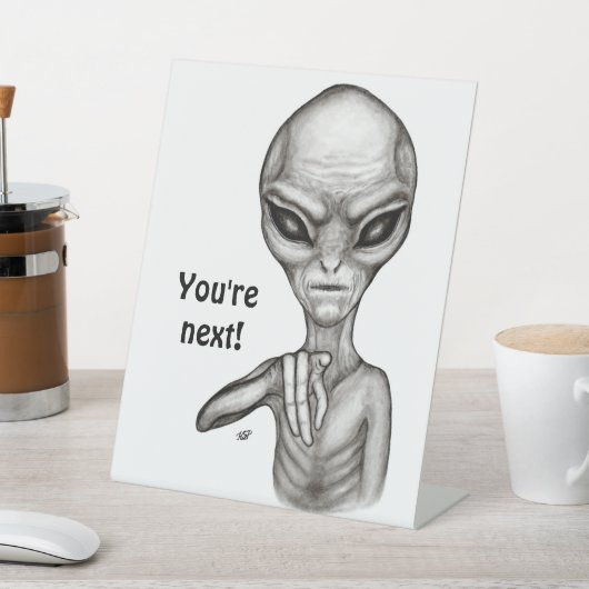 Schlechte Alien, Sie sind als Nächstes dran! Sockelschild (In SItu)